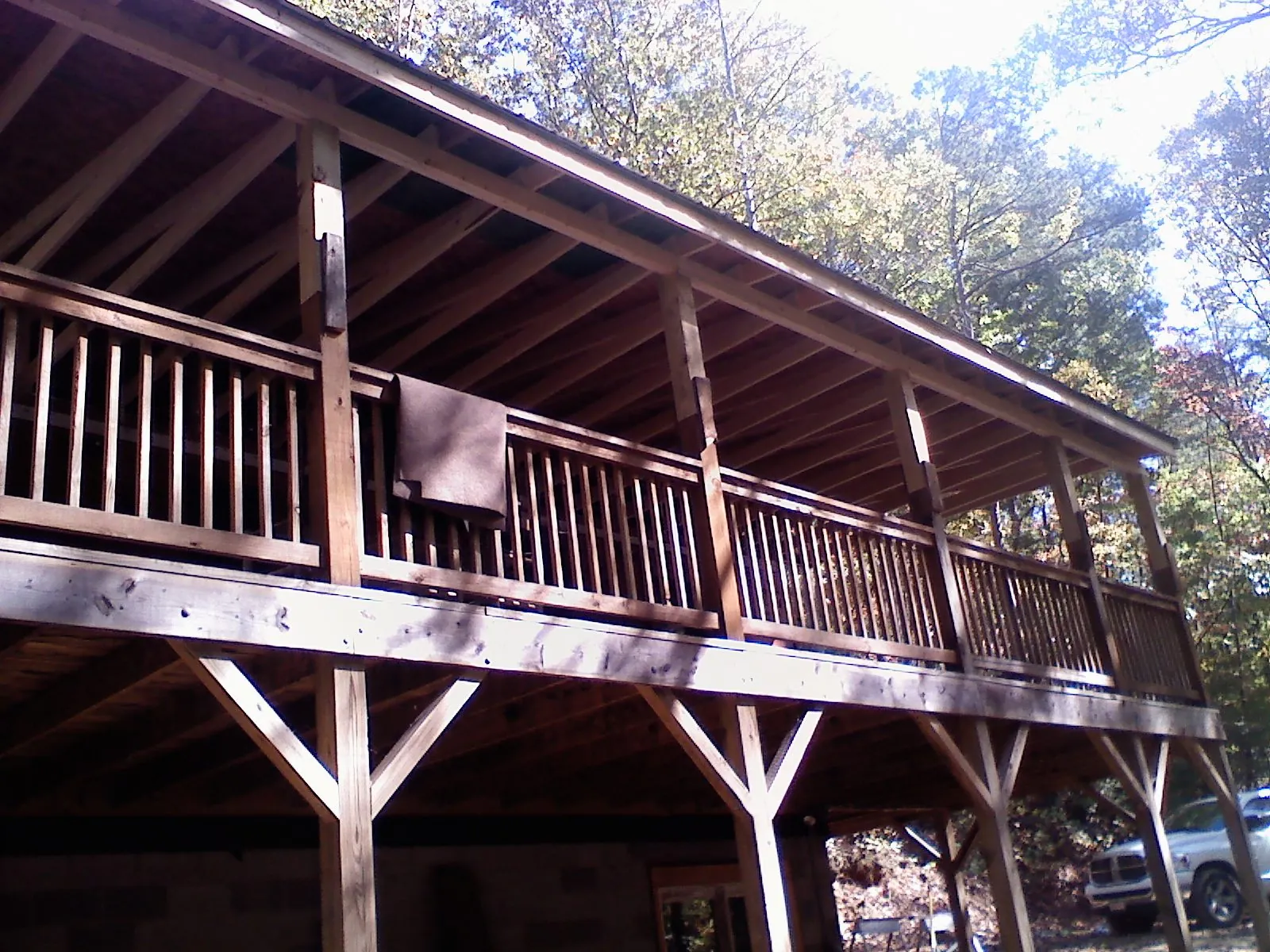 Timber framing under a new elevated porch and deck — Roof Leak Repair in Huffman by Roofing Brothers
